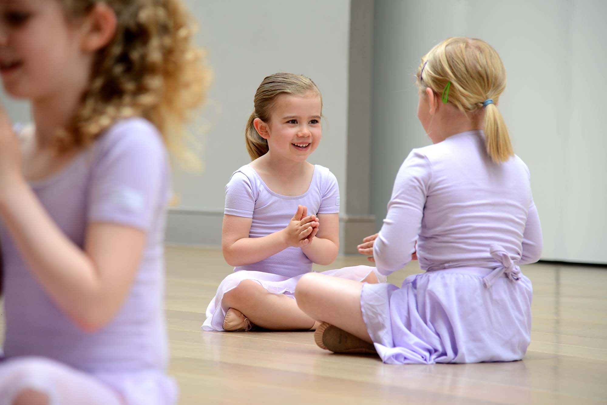 Children laughing during a dance class